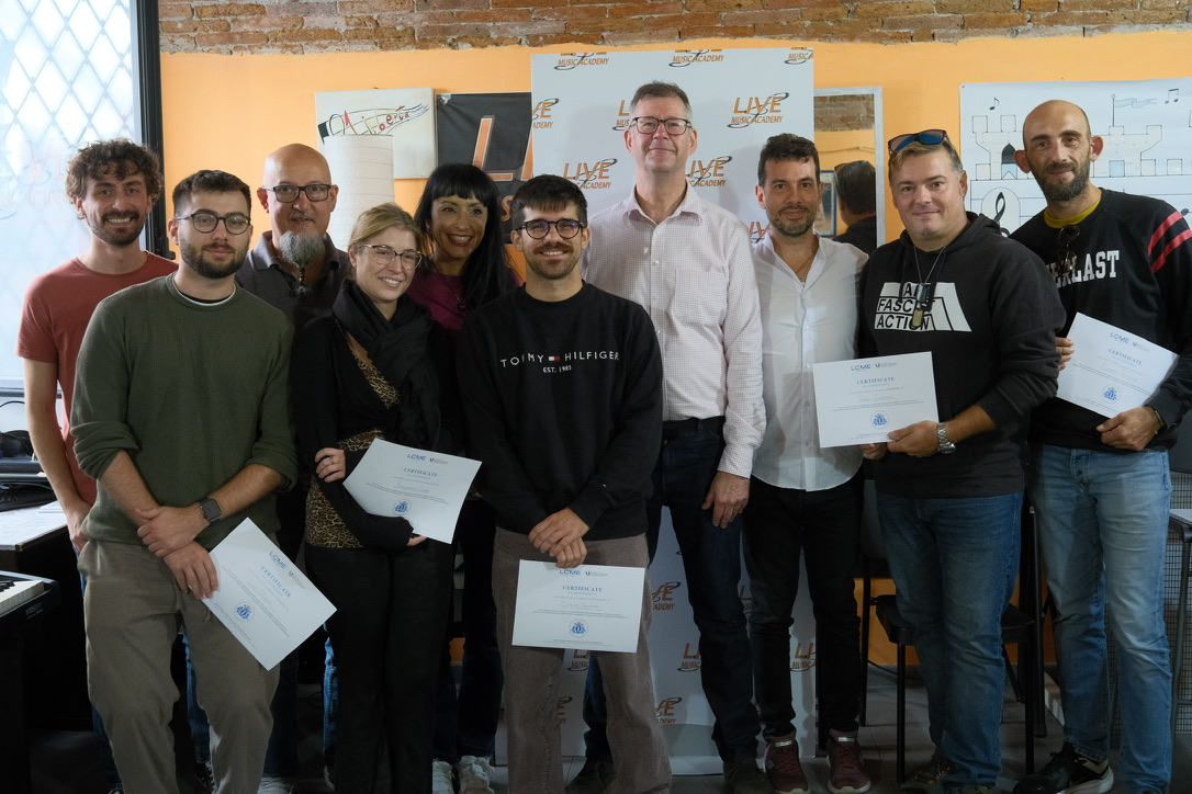 Ben Norbury, Head of Exams, with candidates in Italy